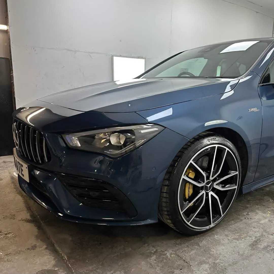 Mercedes CLA35 with new grille and metallic gold brake calipers