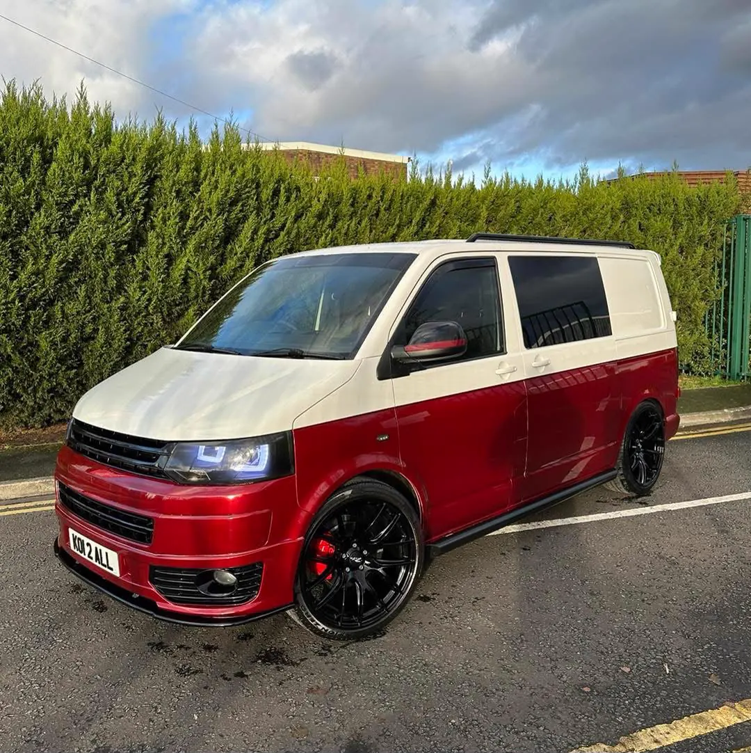 VW Transporter camper in candy red and white