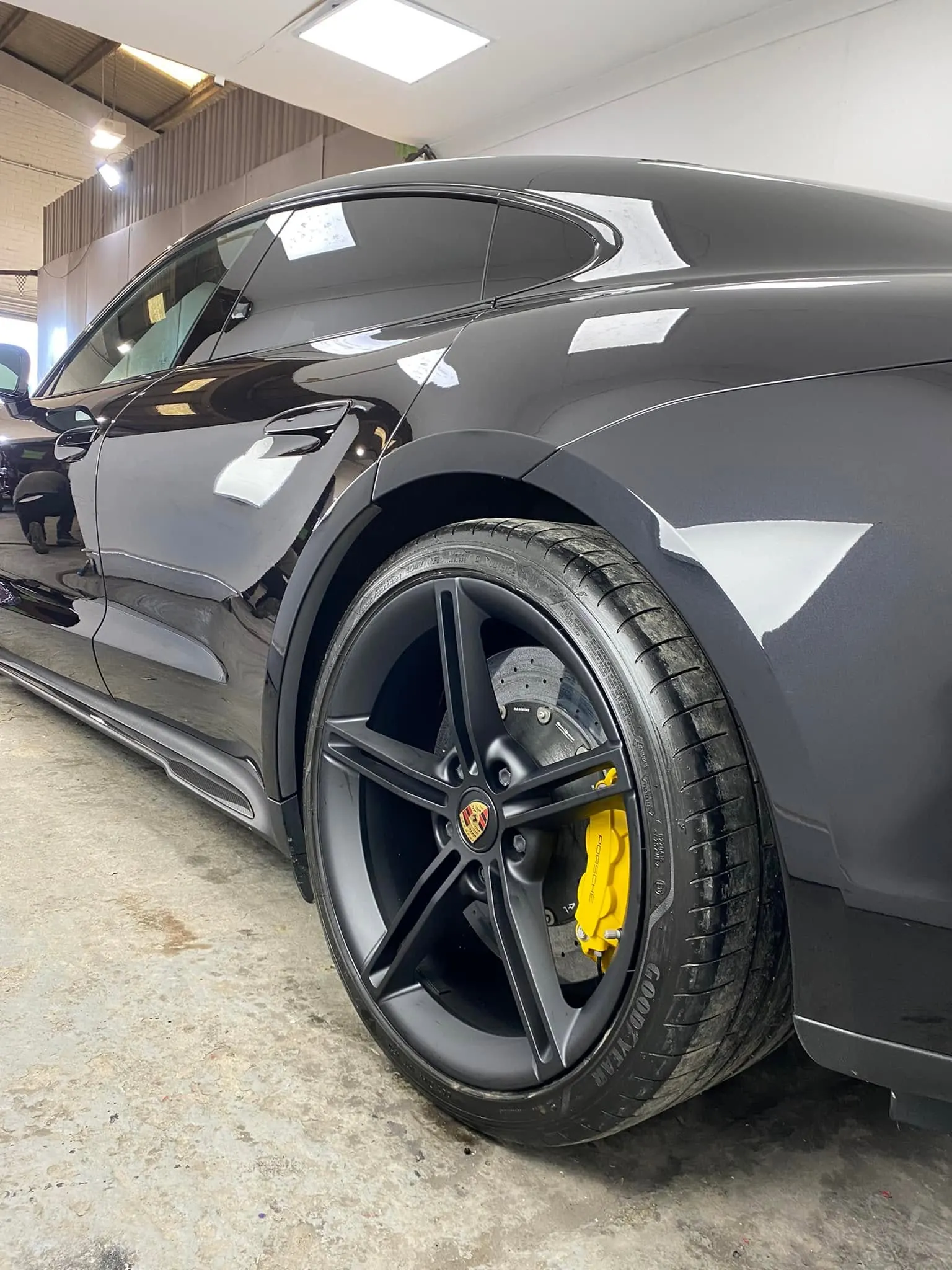 Refurbished Porsche alloy wheel with a precise satin finish